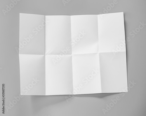 Poster mock-ups paper, white paper isolated on gray background with copy space for text, Blank portrait A4. brochure magazine isolated, can use banners products business cards to showcase your.