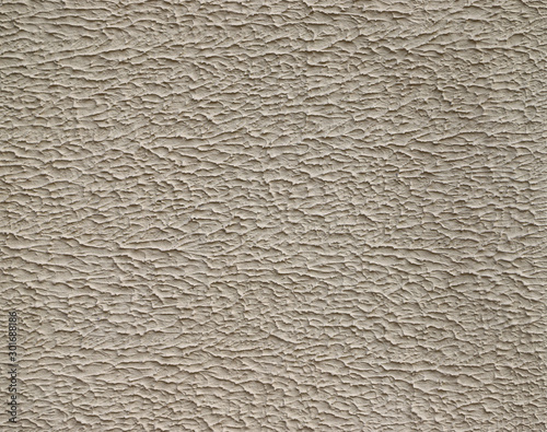 Texture of stucco used as an exterior coating on a building