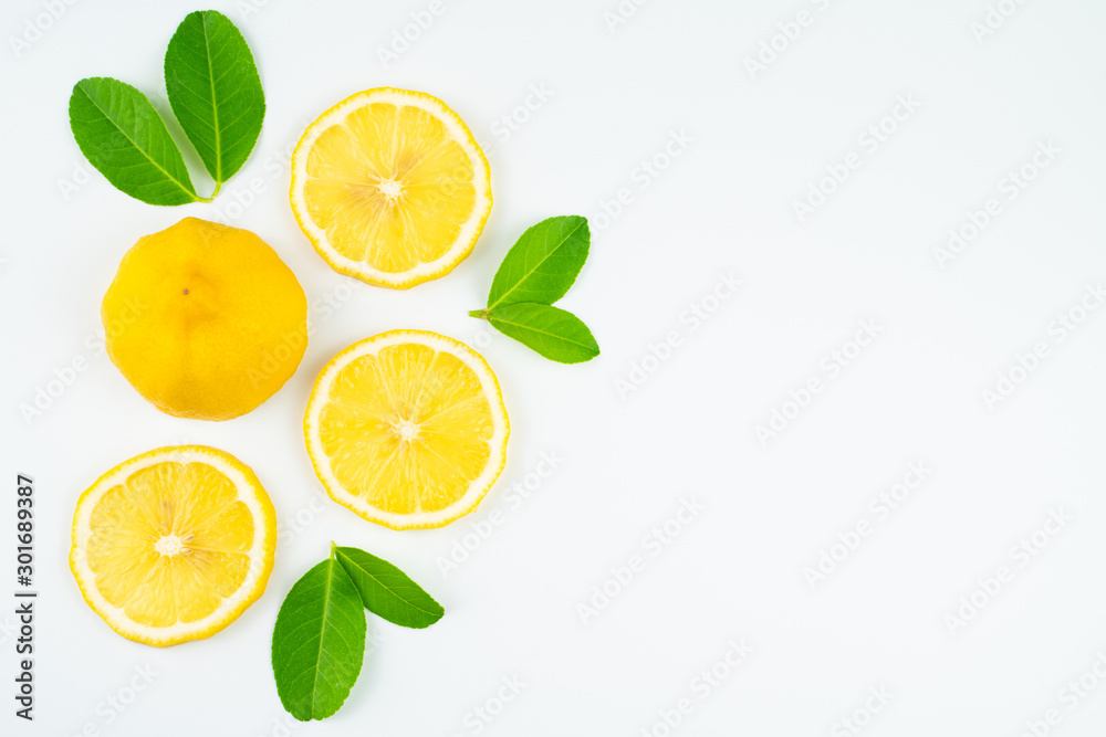 Fresh slice lemon with leaves, vitamin c supplement from natural isolated on white background with copy space Fresh slice lemon with leaves, vitamin c supplement from natural isolated on white background with copy space