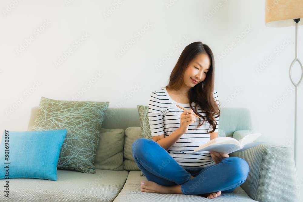 Portrait beautiful young asian women reading book with coffee cup Portrait beautiful young asian women reading book with coffee cup