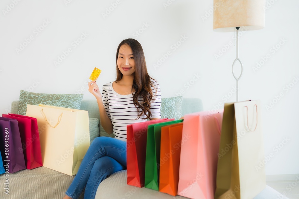 Portrait beautiful young asian women with credit card mobile phone or computer for shopping Portrait beautiful young asian women with credit card mobile phone or computer for shopping