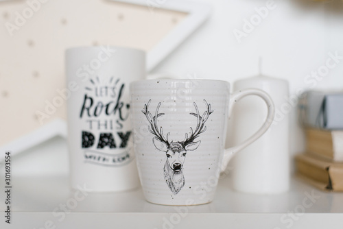 White Christmas mugs on the shelf