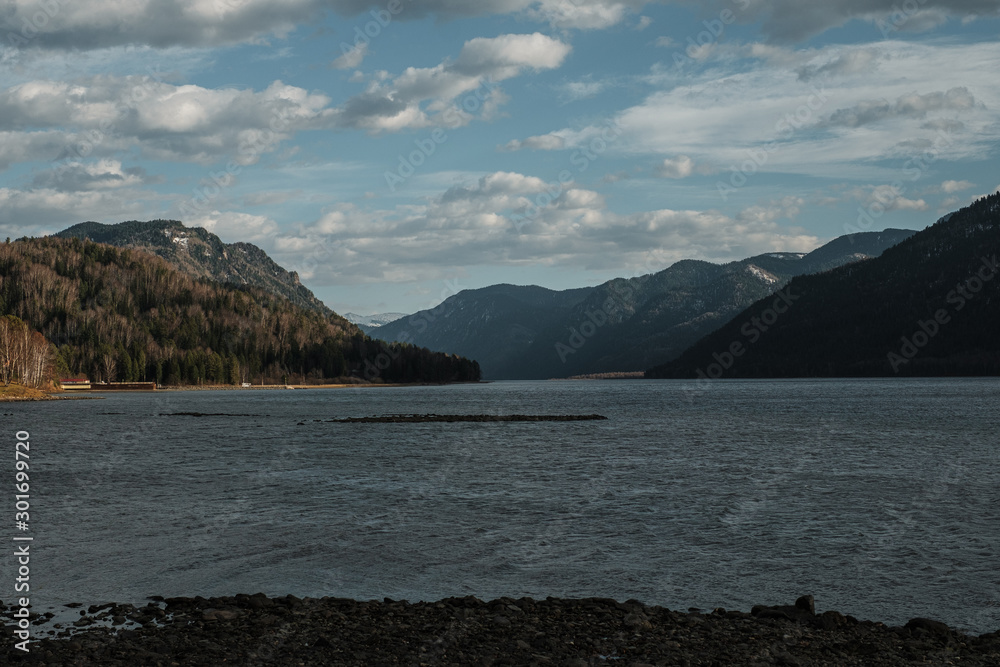 Teletsky mountain lake in Altay with blue autumn sky Teletsky mountain lake in Altay with blue autumn sky