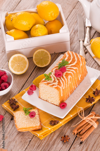 Lemon sponge cake with pomegranate.	