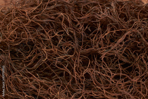Texture of natural fiber photo in close-up (macro), dark background.