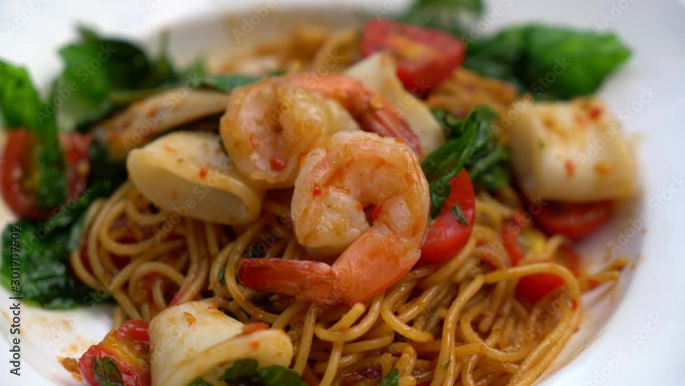 spicy spaghetti seafood - fusion food style spicy spaghetti seafood - fusion food style