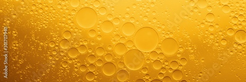 Yellow coocing Oil bubble on water.  photo
