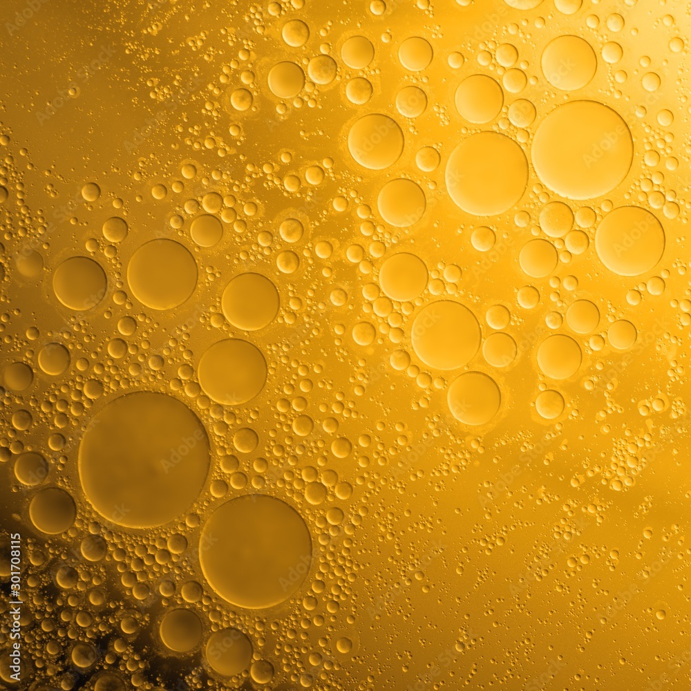 Biodiesel, bubbles biofuel, vegetable oil, yellow and orange emulsion bubbles background