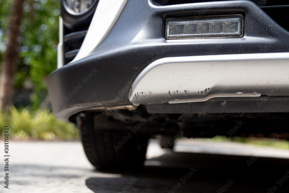 Fototapeta premium many scratches at car bumper