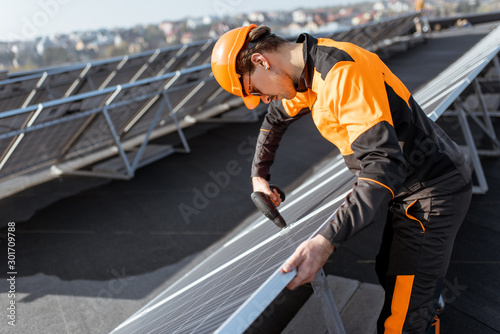 Workman on the solar station