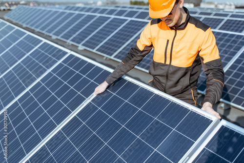 Workman on the solar station