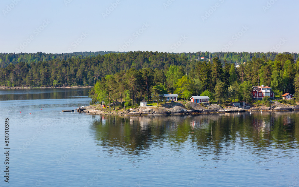 Sweden, small houses on an island in Baltic Sea