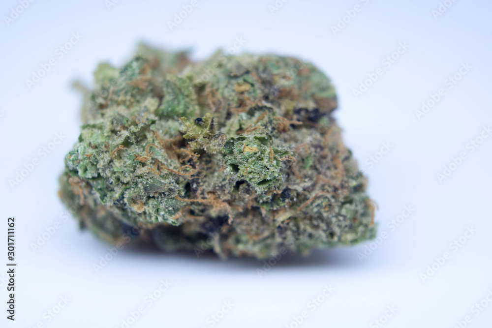 macro shot of a hybrid marijuana nugget macro shot of a hybrid marijuana nugget