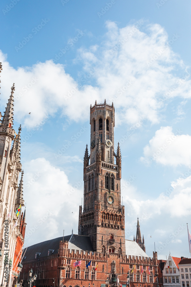 Grote Markt square or Market Square in Brugge and Belfort tower, Belgium