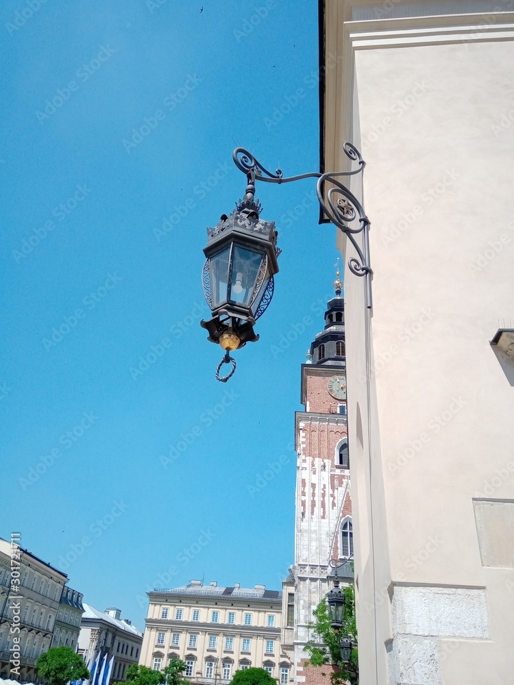 street lamp on wall of old building