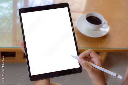Mockup woman hand using blank screen digital tablet.