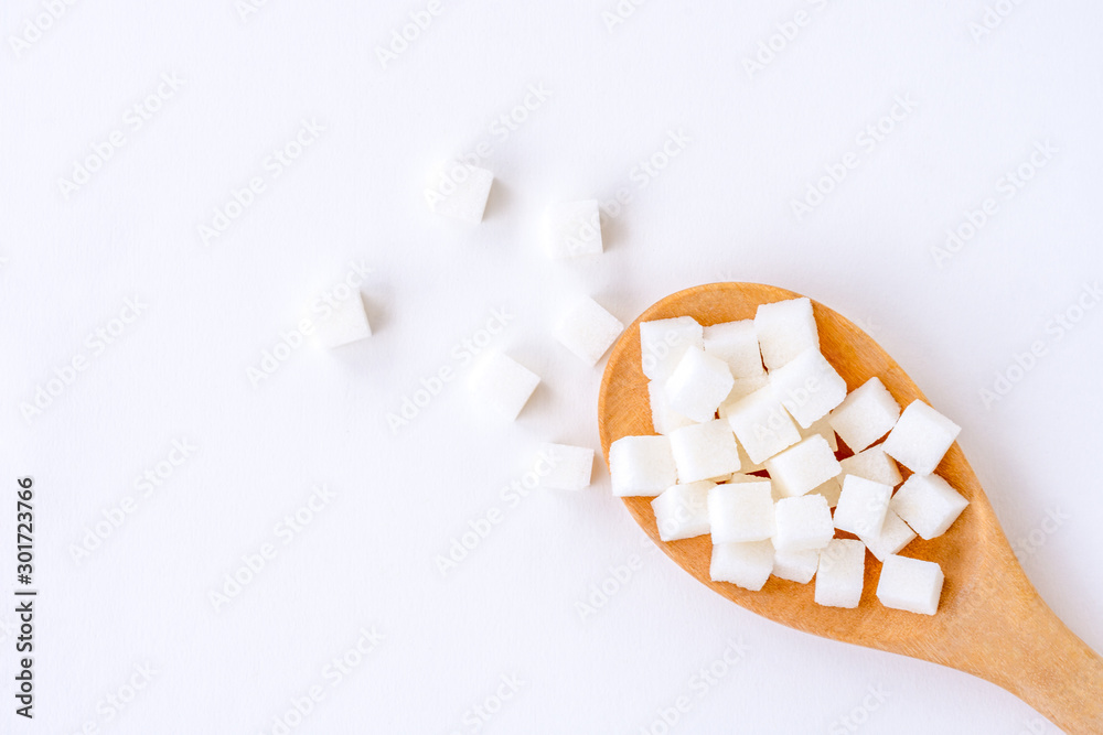 sugar cubes isolated on white background . sugar cubes isolated on white background .