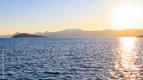 Beautiful sunset on the Mediterranean Sea with islands and mountains