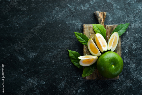 Billede på lærred Sweetie green citrus fruit