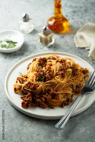 Homemade pasta with tomato sauce and beef