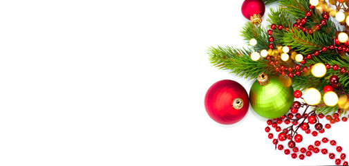 Red Christmas and New Year border Decoration, isolated on white background. Border art design with holiday baubles. Beautiful Xmas tree closeup decorated with balls, garland, tinsel. Top view, flatlay