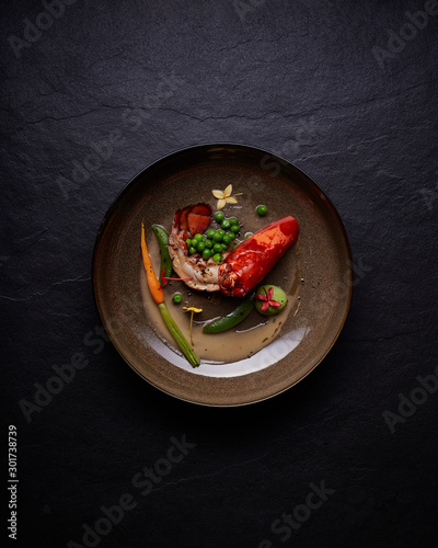 Beautiful and tasty food on a plate, exquisite dish, creative restaurant meal concept.