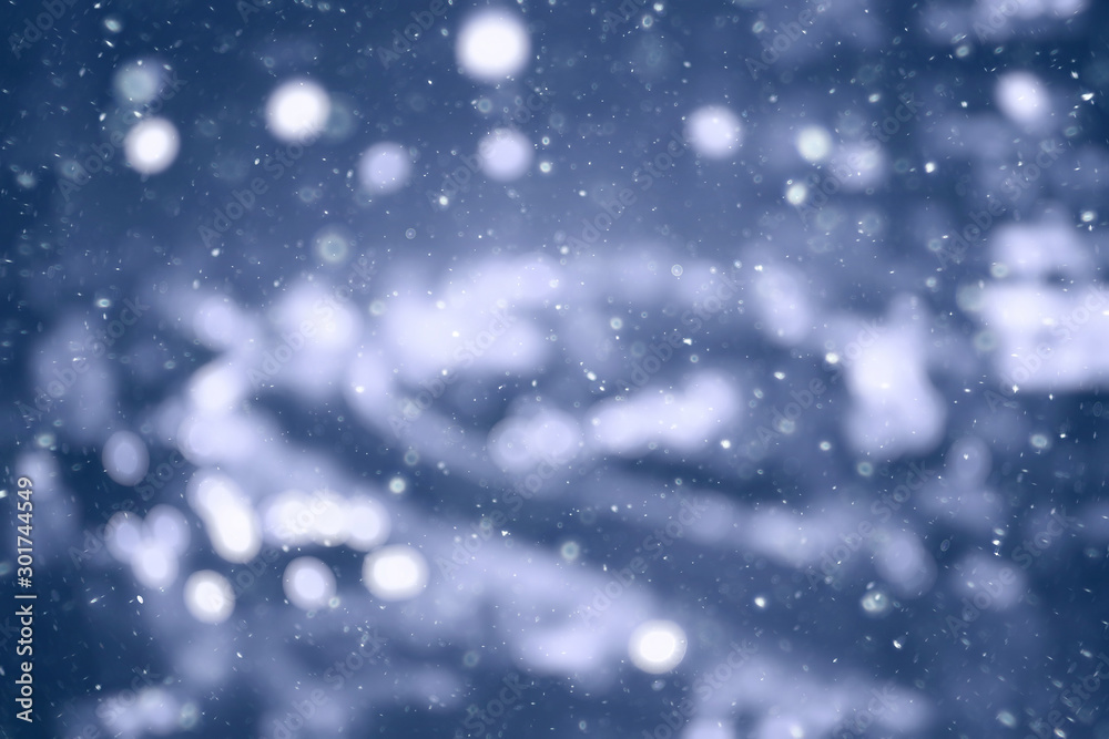 city lights snow glow background blurred / cityscape blurred bokeh, snowy  weather seasonal background winter December фотография Stock | Adobe Stock