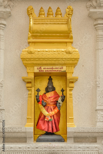 SINGAPORE, SINGAPORE - OCTOBER 08, 2016 : Statue of Sri Vaishnavi in Sri Veerama kaliamman temple in Little India, Singapore It is one of the oldest temples in Singapore. photo