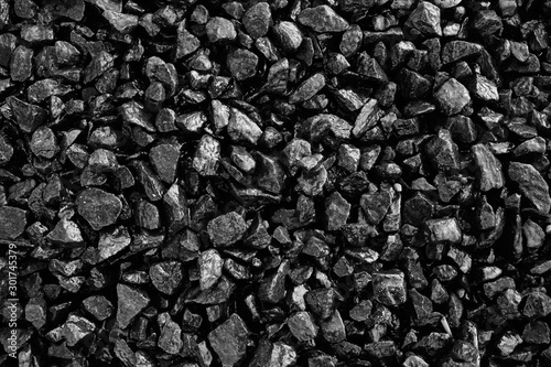 Black Stones background. Abstract texture with copy space.