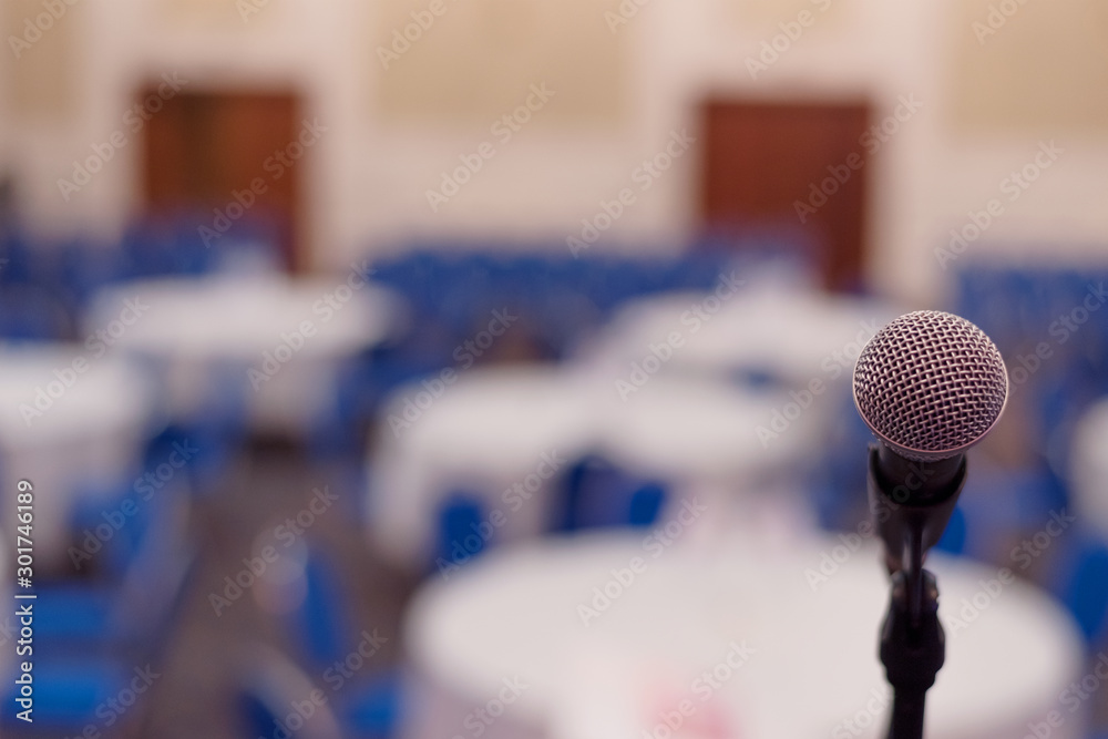 Focus on Microphone in conference room or hall, prepairing for business conference. Focus on Microphone in conference room or hall, prepairing for business conference.