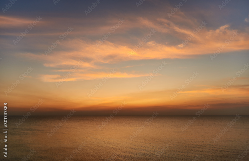 sunset over the sea, clouds, skyline 