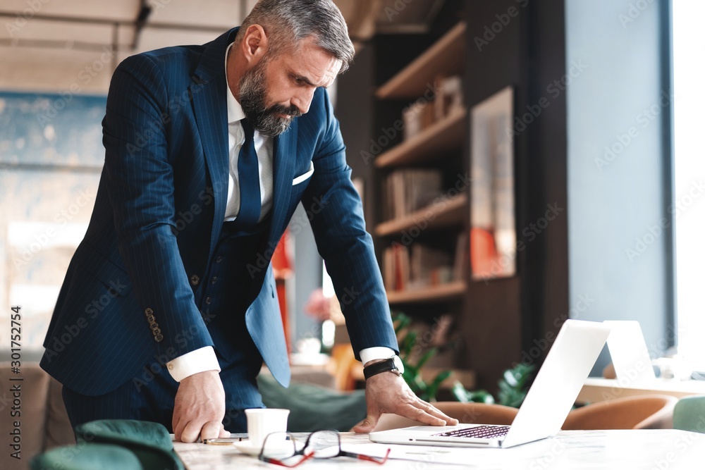 Fototapeta premium business man working with documents and laptop