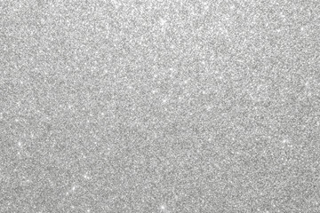 Silver glitter background texture white sparkling shiny wrapping paper for Christmas holiday seasonal wallpaper decoration, greeting and wedding invitation card design element