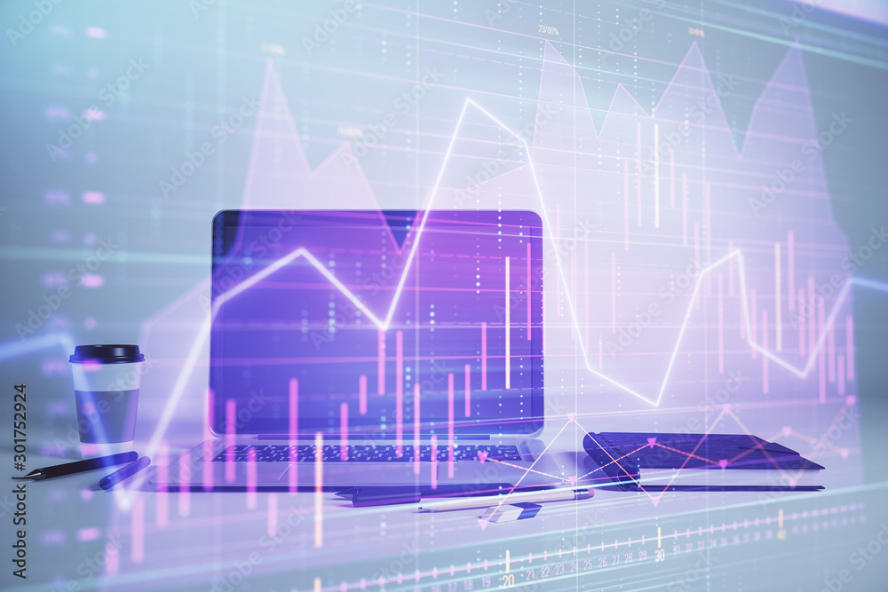 Forex graph hologram with desktop office computer background. Double exposure. Concept of financial analysis. Forex graph hologram with desktop office computer background. Double exposure. Concept of financial analysis.