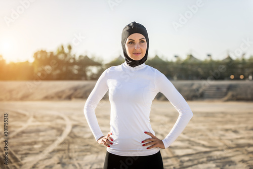 Arabian woman training outdoors © oneinchpunch