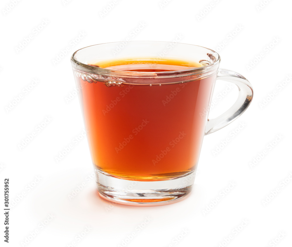 Black tea in glass cup isolated on white Black tea in glass cup isolated on white