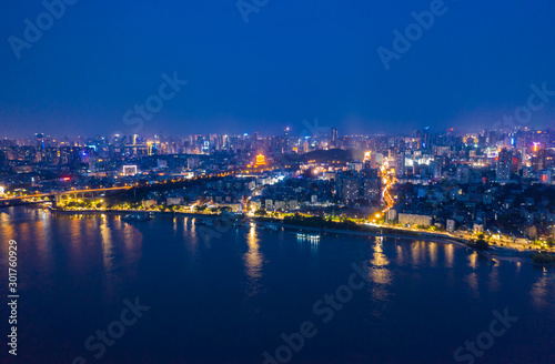 Wuhan skyline and Yangtze river with supertall skyscraper under construction in Wuhan Hubei China. © AS_SleepingPanda