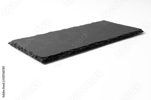 Black stone plate isolated on white