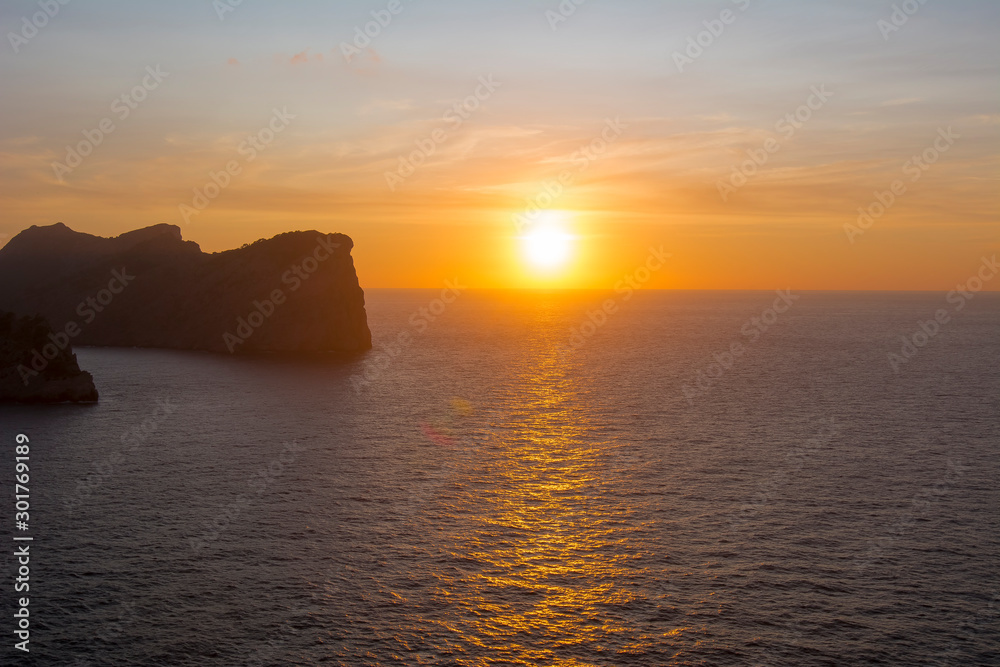 Sunset at sea from Formentor cape, Mallorca, Spain