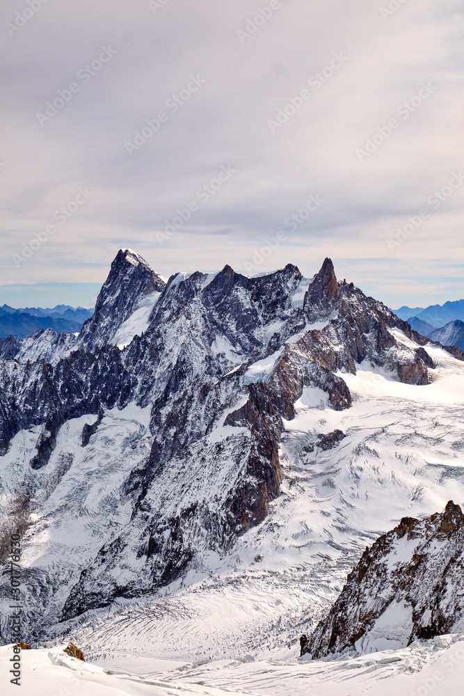 Mountain peak in the Mont Blanc massif. Alps, France. Vertical landscape.