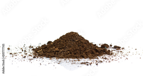 Dirty earth on white background. Natural soil texture