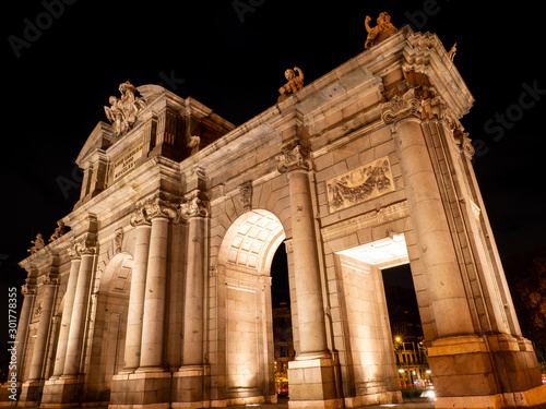  monument of the alcala de madrid gate illuminated at night