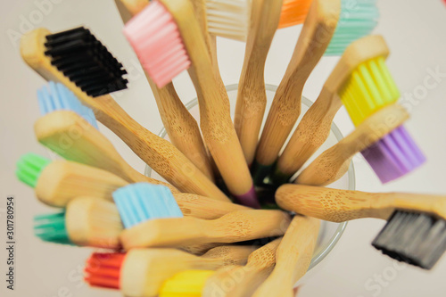 Rainbow colorful bamboo toothbrushes. Tooth health care. Eco friendly 