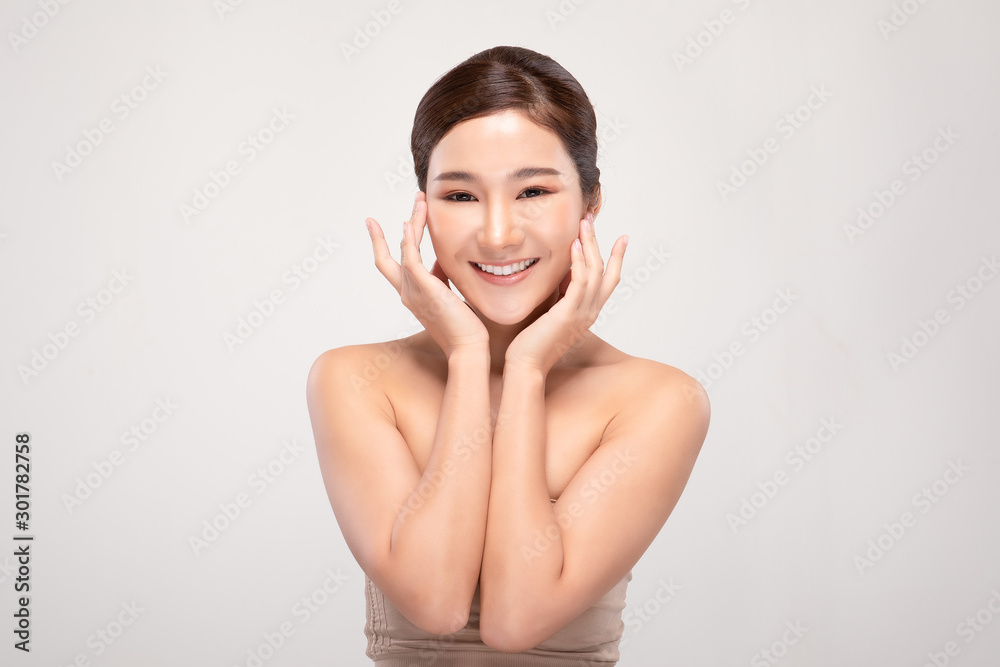 Beautiful Asian young woman touching soft cheek smile with clean and fresh skin Happiness and cheerful with positive emotional,isolated on white background,Beauty and Cosmetics Concept Beautiful Asian young woman touching soft cheek smile with clean and fresh skin Happiness and cheerful with positive emotional,isolated on white background,Beauty and Cosmetics Concept