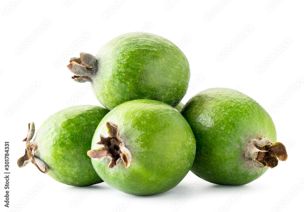 Pile of ripe feijoa on a white background. Isolated. Pile of ripe feijoa on a white background. Isolated.