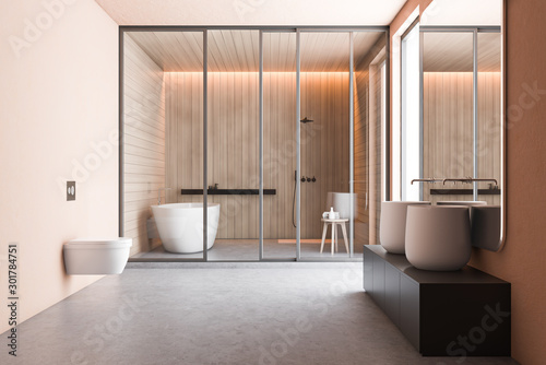 Beige bathroom with massive sink and toilet