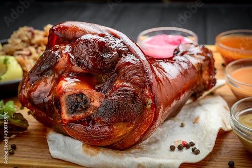 Baked pork shank with sauerkraut with bigus photo