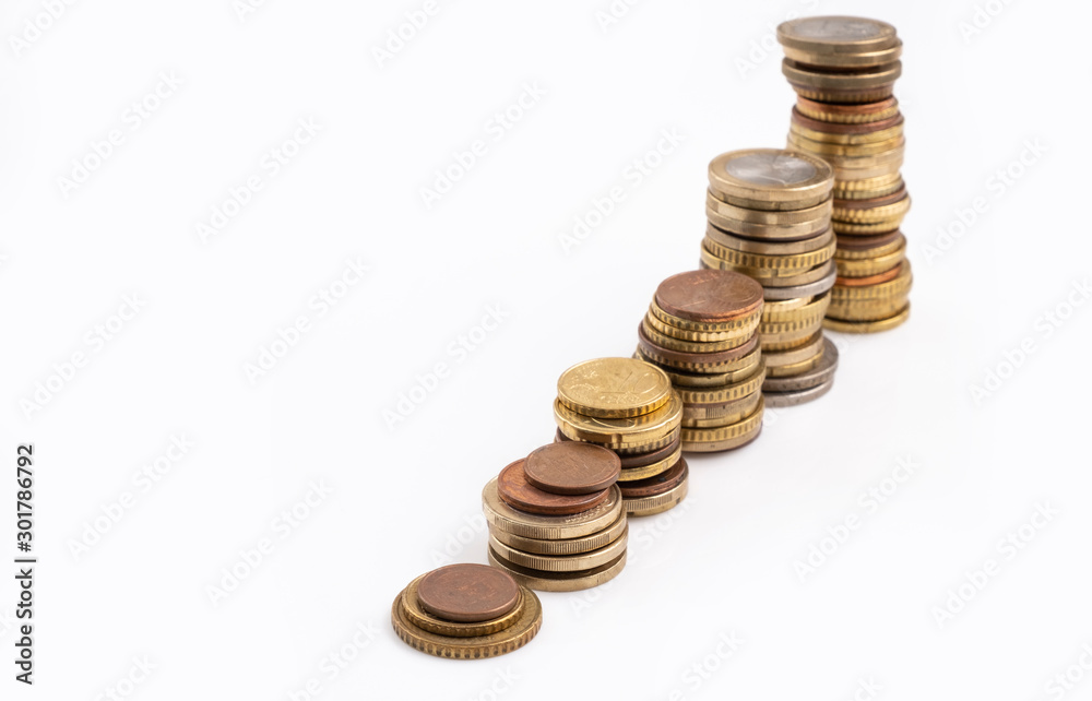 Rising stacks of euro coins, including small 5 and 10 cent coins Rising stacks of euro coins, including small 5 and 10 cent coins