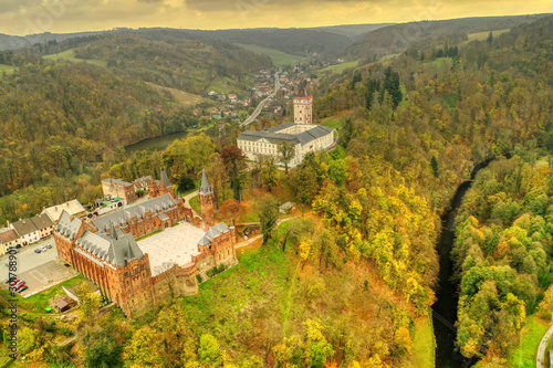 aerial shot of  two castle side by side in Hradec nad moravici one red and one bily in autumn colors © Martin