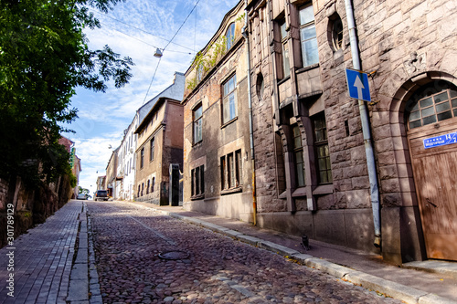 VYBORG, RUSSIA - OCTOBER 1, 2019: Vyborg city, different streets and buildings, large and wide angle, far away, flowers and wooden windows, paving stones, old unusual old houses